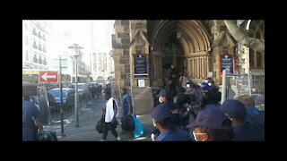 South Africa - Police escort Cape refugees to temporary accommodation in Bellville (wTT)