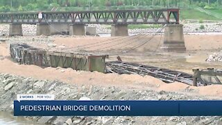 Historic Arkansas River pedestrian bridge undergoes demolition