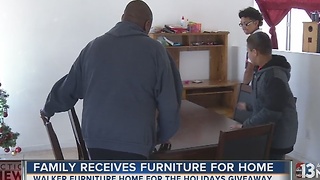 Family of 5 receives dining table, beds from Walker Furniture