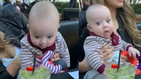 Baby Desperately Tries to Taste Mom's Spicy Margarita