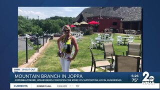 Mountain Branch in Joppa says "We're Open Baltimore!"