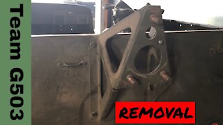 Team G503 Removing spare tire carrier and jerry can holder from a 1943 Willys MB