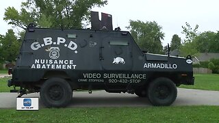 Police park armored truck in park to deter crime