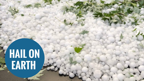 Hailstones the size of tennis balls damaging homes and cars