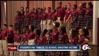 Students pay tribute to school shooting victims