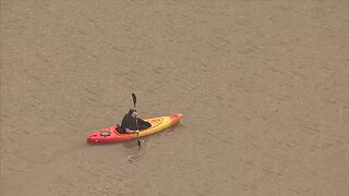 Kayakers enjoying stormy weather in Valley