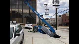 Boom lift falls through underground parking garage in Denver; 2 workers rescued