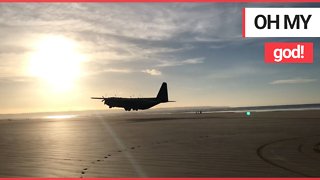 Incredible video shows the moment a Hercules plane lands on a British beach