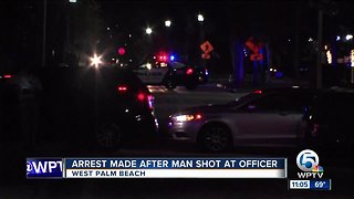 Arrest made after man shot at officer