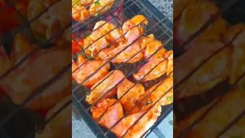 Delicious chicken wing grilled on charcoal and in nature