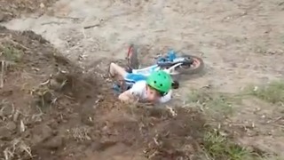Young Dirt Biker Loses Balance And Face Plants On The Ground