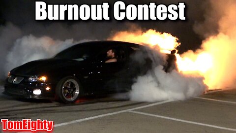 Pontiac GTO shooting fireballs out the exhaust during a Burnout Contest