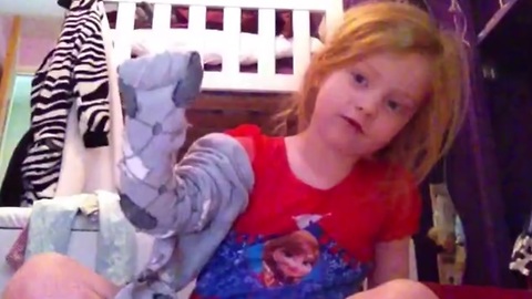 Little girl adorably explains how to put on tights