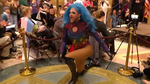 A drag queen performs in the Minnesota Capitol for "Trans Day of Visibility."