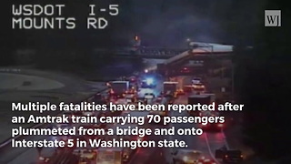 Amtrak Train Derails on Bridge Over Interstate Highway