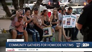 Community members gather at the Liberty Bell to honor homicide victims
