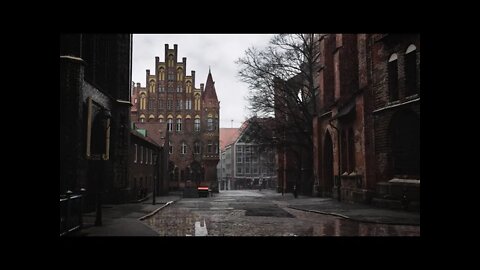 Rainfall on the cobbled streets next to St Mary's Church in Lübeck