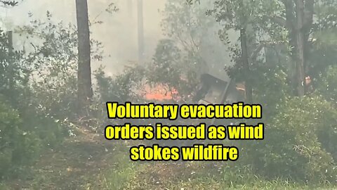 Voluntary evacuation orders issued as wind stokes wildfire