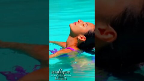 ASIAN BIKINI MODEL SWIMMING IN THE POOL WHILE ON VACATION