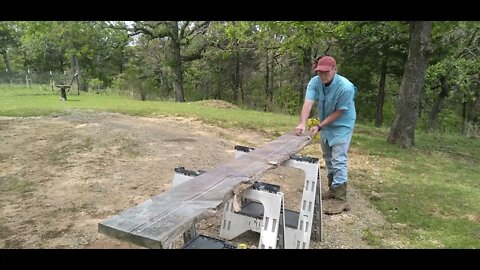 Ripping cedar cut on chainsaw mill.