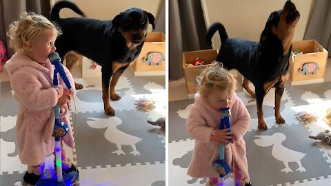 Adorable Singing Duet Between A Girl And Her Bestie Rottweiler