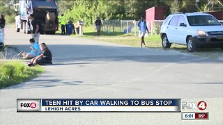 Teen hit by car while walking to bus stop