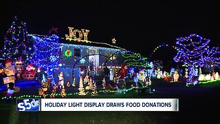 Brunswick couple's holiday lights display attracts folks from all over for a good cause