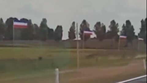 Dozens of Dutch Flags Fly Upside Down Along the Motorway, Symbolizing a Nation in Distress