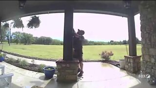 UPS driver caught on camera fixing American flag