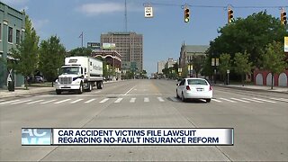Lawsuit challenges changes to Michigan auto insurance law