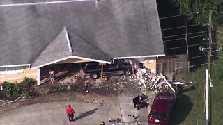 SUV into Pasco home