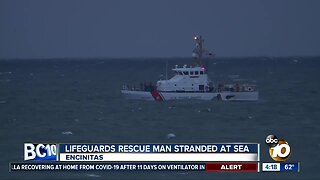 Lifeguards rescue man stranded at sea