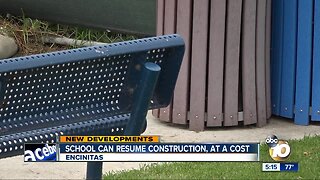 School can resume expansion project, at a cost