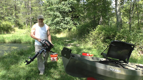 Nucanoe Frontier 12 kayak with outboard motor for hunting and fishing