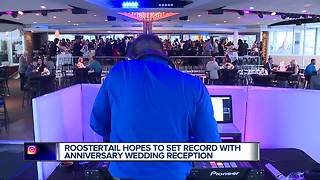 Detroit's Roostertail celebrates anniversary with couples married there in world record attempt