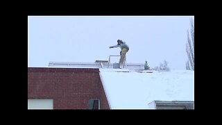 Epic Snowboarding Off Of A Roof Fail