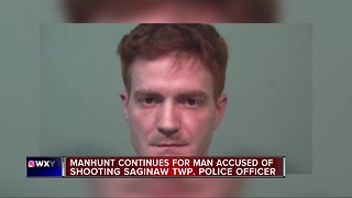 Saginaw Township police officer shot in face during traffic stop; manhunt underway