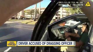 VIDEO: Body cam shows Florida officer being dragged by speeding car