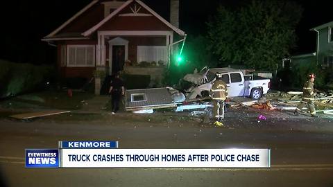 Truck crashes through two homes after leading police on chase across two towns