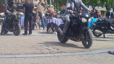 Motorcycle blasts through Amsterdam market at high speed
