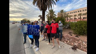 Around 100 people gather to protest Clark County School District sports decision