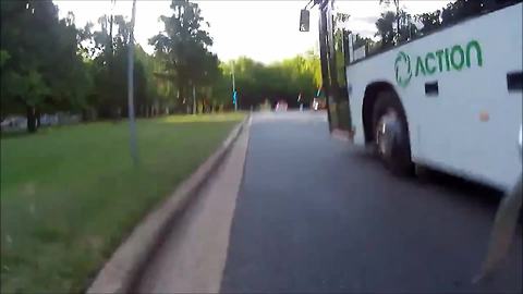 Reckless bus driver nearly crushes cyclist