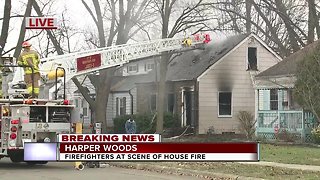 Firefighters at scene of house fire in Harper Woods