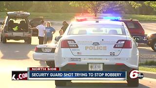 Security guard shot after exchanging gunfire with multiple suspects during attempted robbery