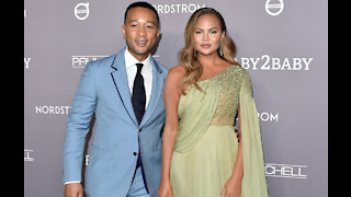 Chrissy Teigen buys John Legend a robe every year