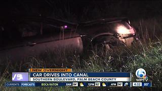 Car drives into canal along Southern Boulevard