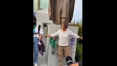 Leftists surround Catholic woman in Mexico as she protects a statue of St. Michael