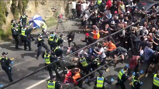 Anti Lockdown Protestors Break Thru Police Line in Australia