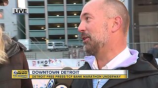 First Detroit Free Press/TCF Bank Half-Marathon runner crosses the finish line