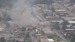 Crews battle building fire near downtown Tulsa